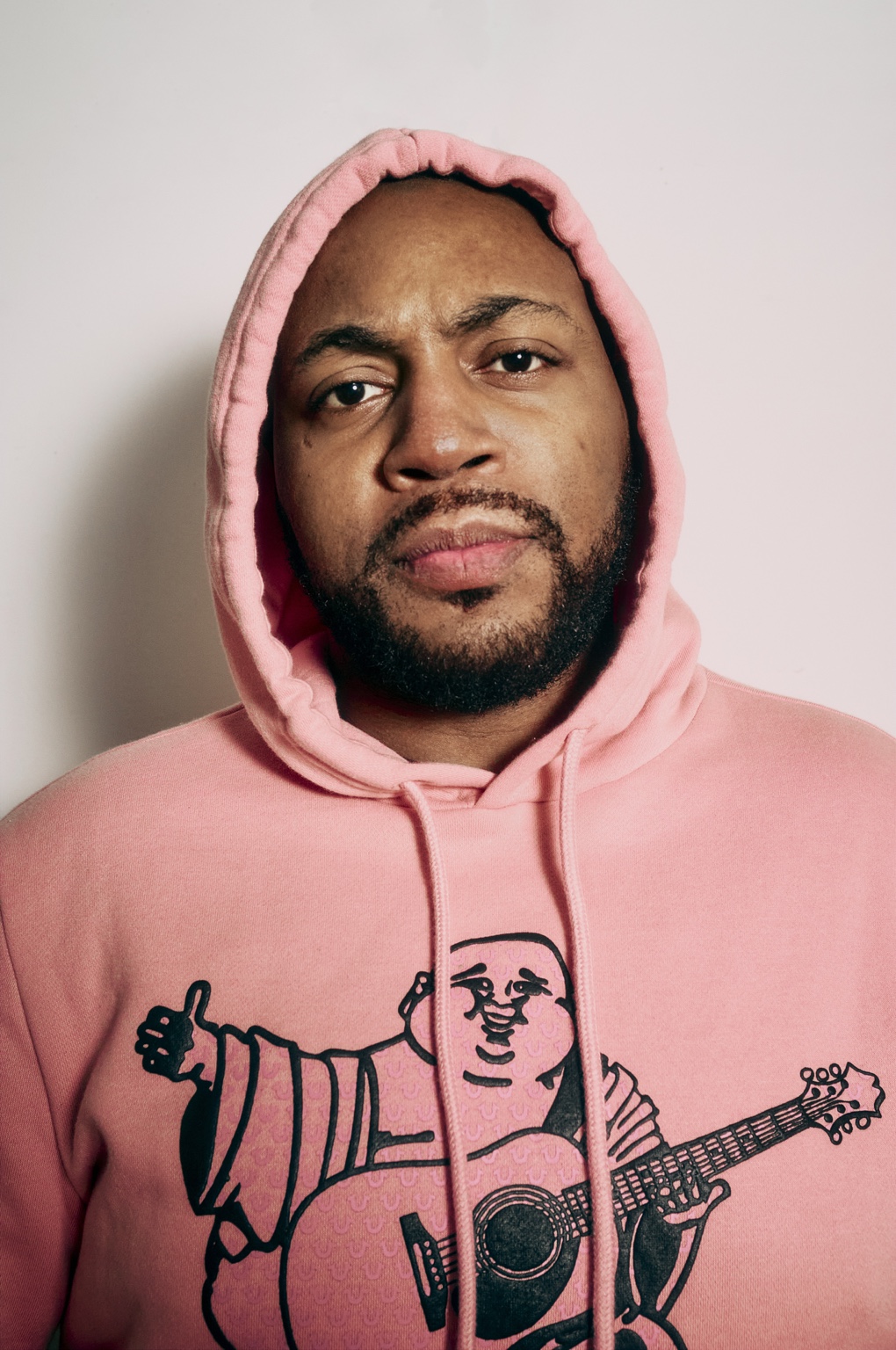 Portrait of Master S BTB in a pink hoodie